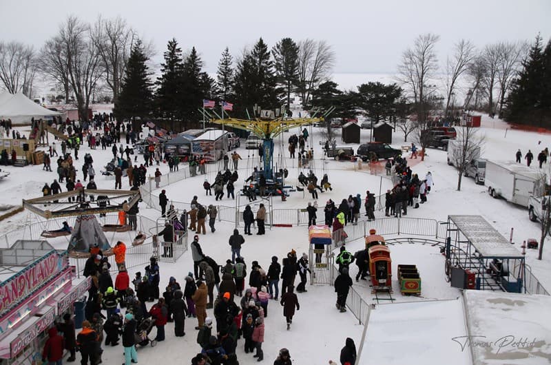 Tip-Up Town USA winter festival on frozen Houghton Lake with ice fishing and winter activities