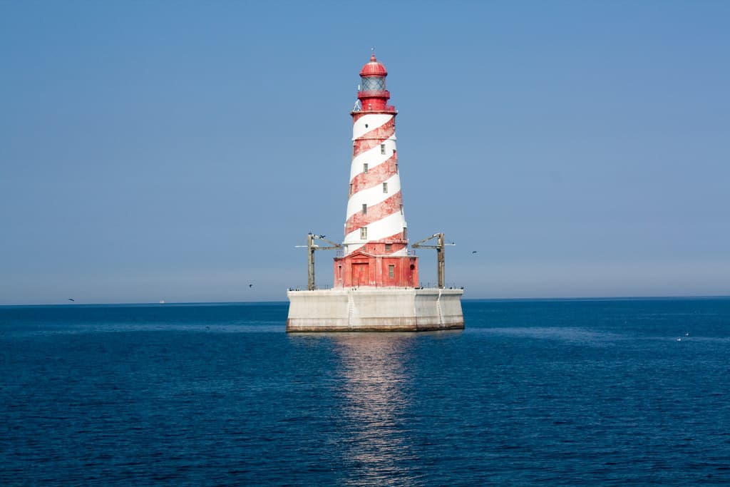 White Shoal Lighthouse with distinctive red and white stripes